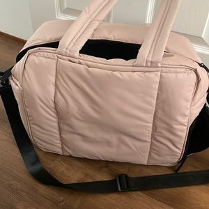 Pink calpak carry on